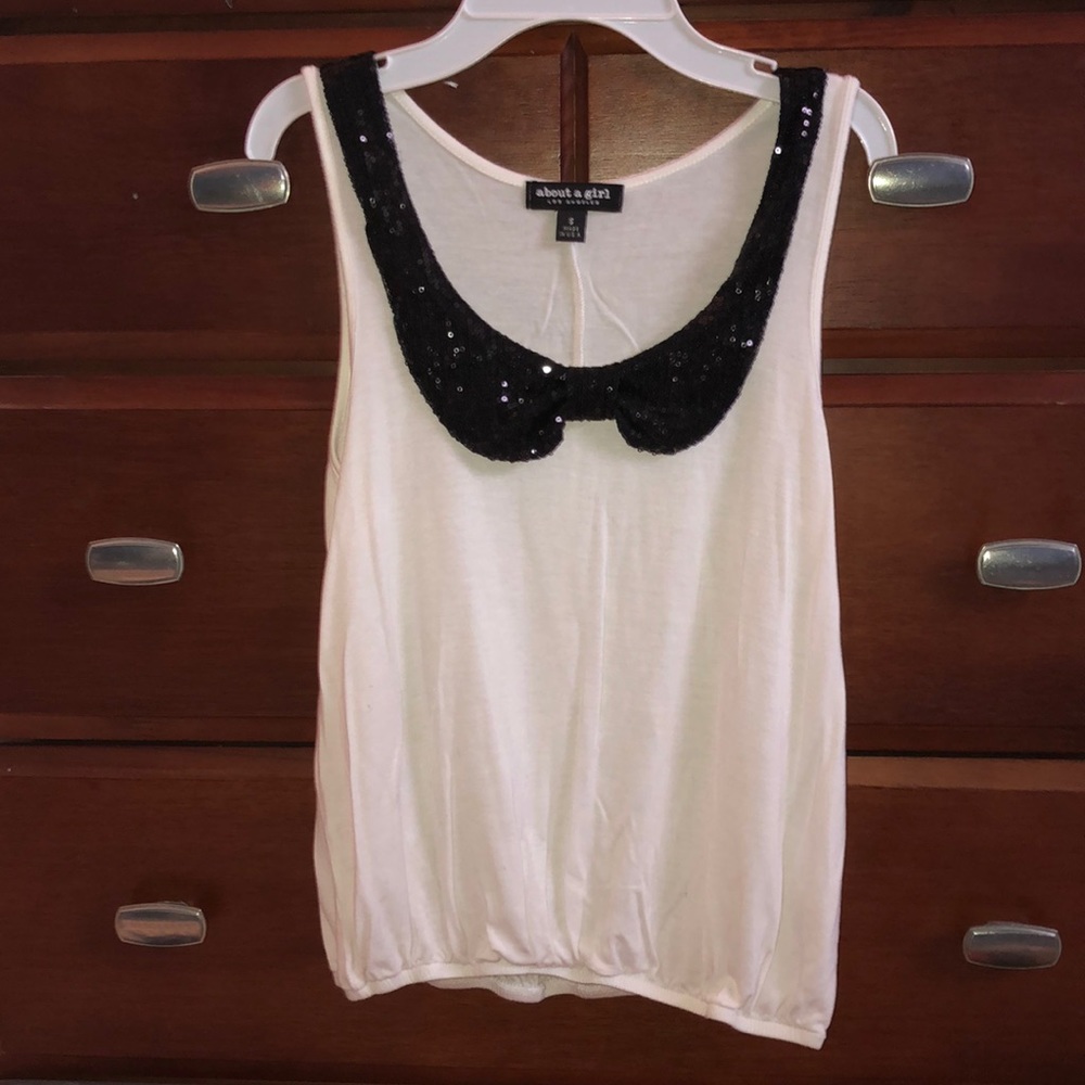 Tank with black sequin bow neckline